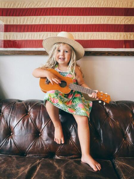 Singing girl with guitar