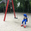 Littel boy, alone, playground