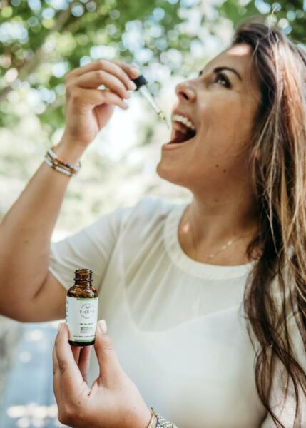 CBD oil with woman