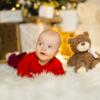 Baby with Teddybear on blanket