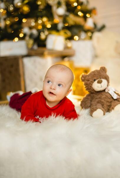 Baby with Teddybear on blanket