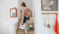 Housemaid in private staircase