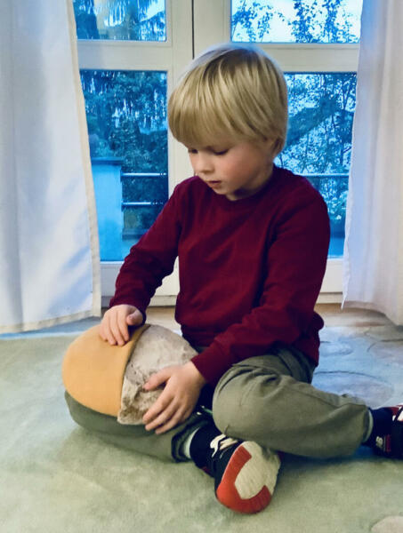 Little boy playing with inmuJOY