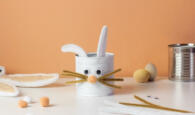 Reuse concept art from tin can. Eco friendly bunny craft. Handmade decoration easter rabbit. Kids DIY ideas.