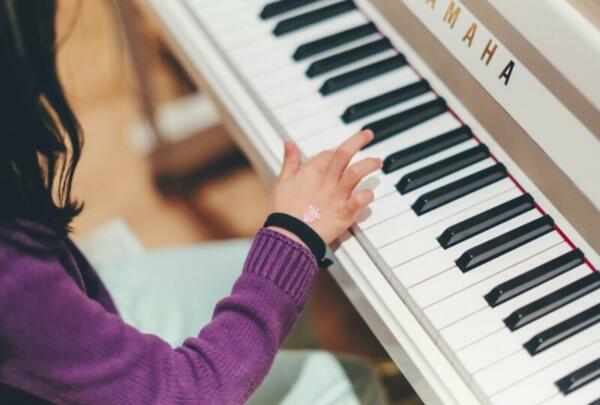 Childs hands on keyboard