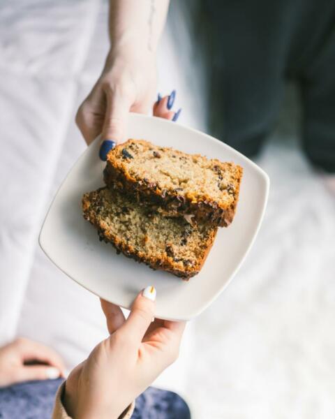 Banana Bread on plate with Hands