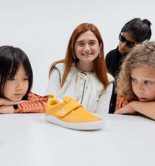 BonnieWright_with_Kids_and_Vivobarefoot_shoe